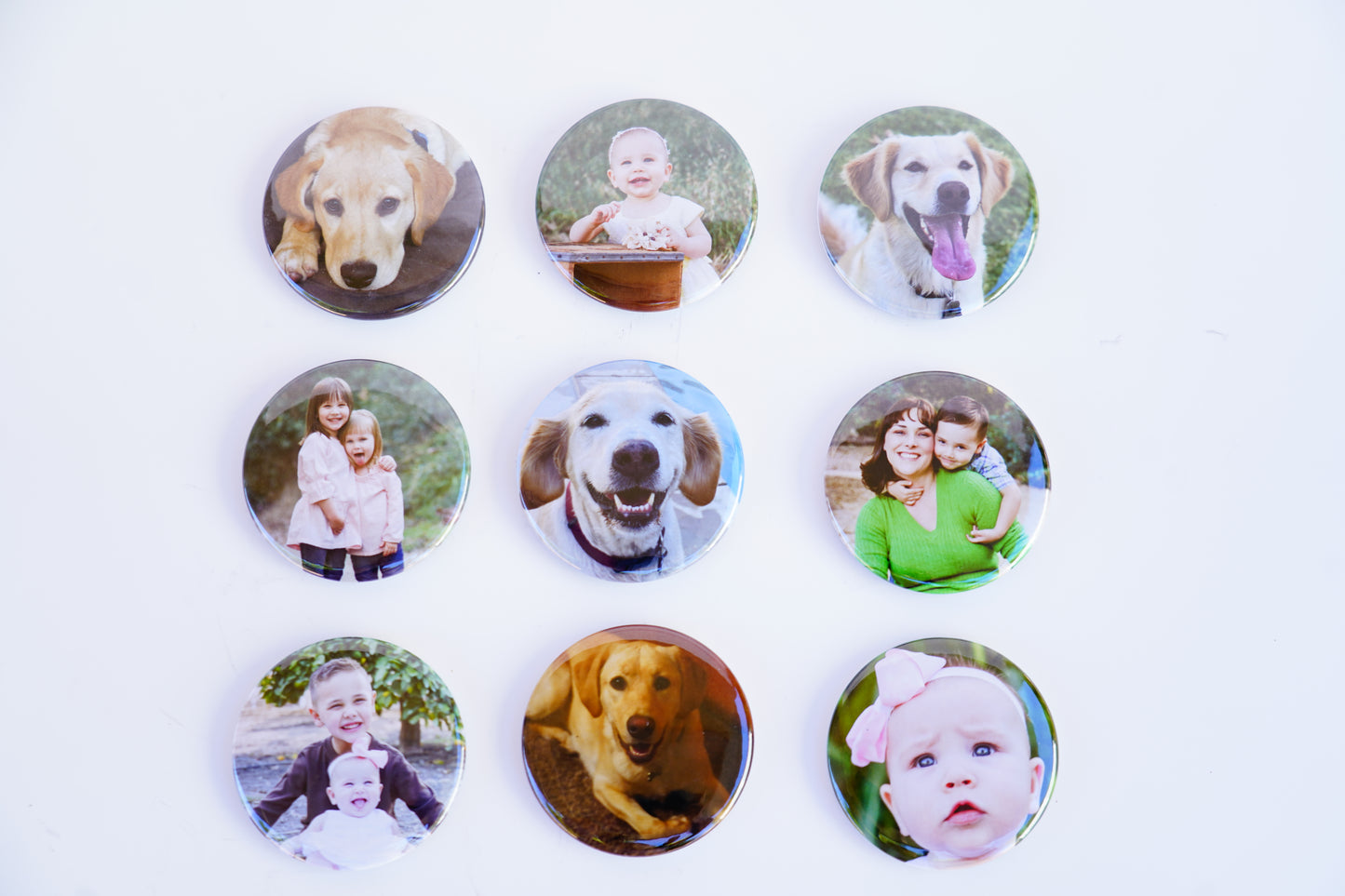 Collection of custom 2-inch circle photo magnets with assorted photos