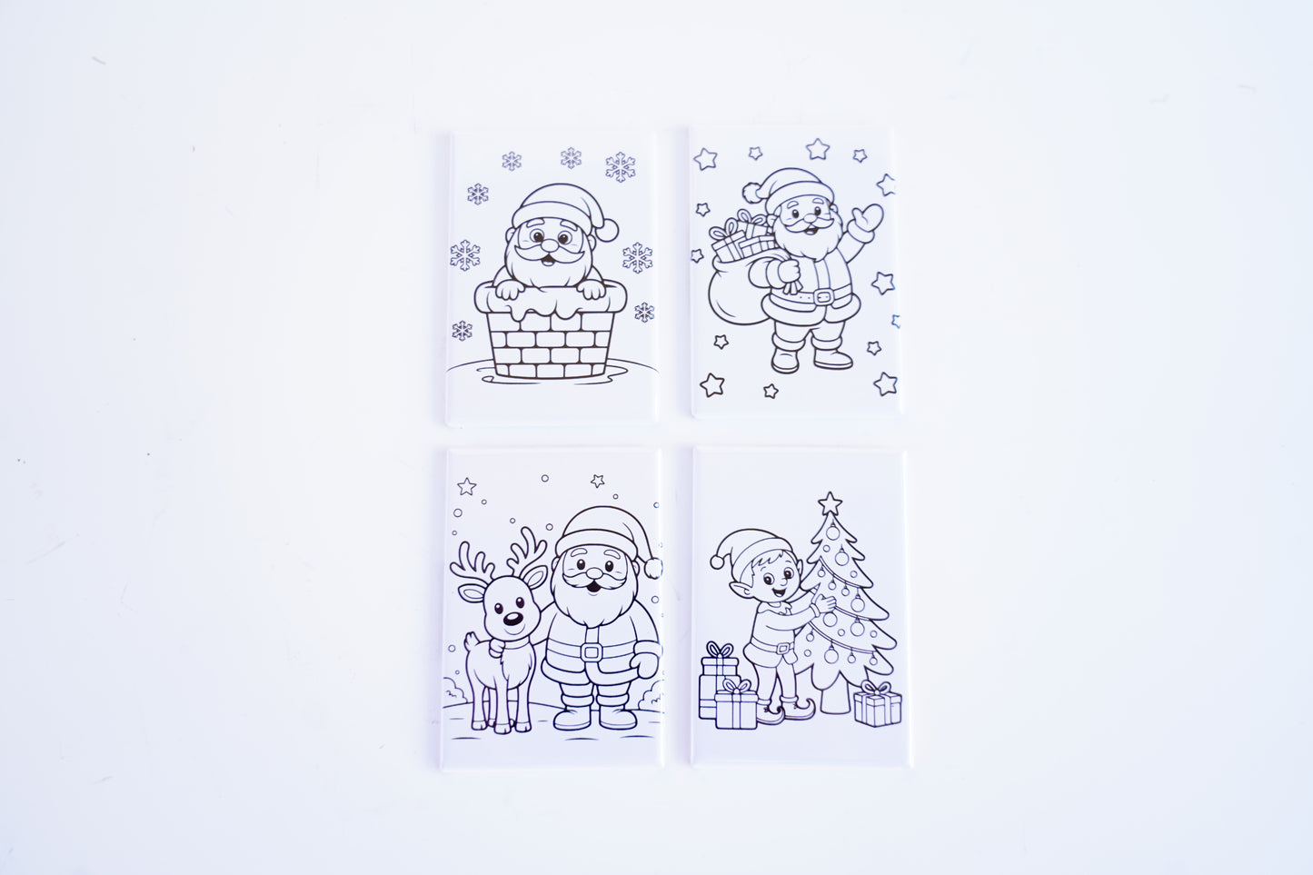Set of Christmas-themed coloring pages with characters and decorations on a white background.