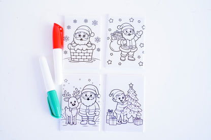 Coloring with dry erase with Santa Claus illustrations and a marker on a white background